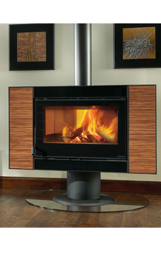 NORDICA-EXTRAFLAME CARILLON 16:9 EVO 9,4 Kw. (wengué o Zebrano) Revestimiento exterior de zebrano o wenge  Base y cuerpo giratorio en el eje  Estufa que gira a 90° Cristal ceramico que resiste hasta 750°