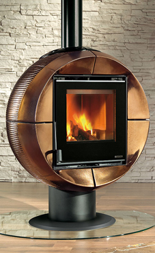 NORDICA-EXTRAFLAME FIREBALL 6 Kw. (blanca infinity , burdeos u oro craquelé) Revestimiento de mayolica Base y cuerpo giratorio en el eje Estufa que gira a 90° Cristal ceramico que resiste hasta 750°C