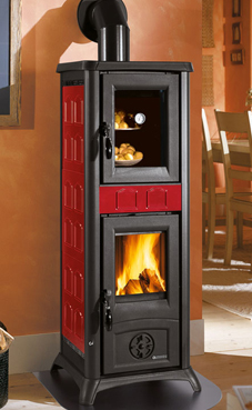 NORDICA-EXTRAFLAME GEMMA FORNO 7 Kw.(Burdeos, elegance capuchino o piedra natural) Hogar de fundición - Revestimiento exterior de mayólica o piedra natural - Puertas y cabezal de fundición esmaltada Raf - Horno esmaltado