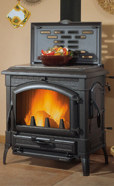 NORDICA-EXTRAFLAME ISOTTA CON CERCHI EVO 11,9 Kw.(estufa de fundición) Estufa totalmente en fundación esmaltada Placa de hierro fundido alisada Cristal ceramico que resiste hasta 750° Puerta de carga lateral