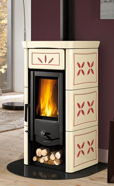 NORDICA-EXTRAFLAME LUCY 6 Kw.(silk vogue amatista) Revestimiento externo en mayòlica echo a mano Hogar en hierro colado  Puerta en hierro colado esmaltado Vidrio ceramico resitente hasta 750°C